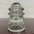 This is a gorgeous antique clear glass Hemingray No. 12 insulator embossed “HEMINGRAY – No. 12 – U.S.A.”. Produced by the...
