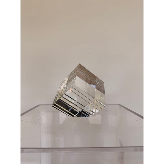Contemporary crystal decorative accent featuring a striking geometric cube design with precision-cut faceted edges that...