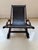 Brazilian style Lounge chair, solid wood frame, curved arms, leather seat, mounted in a sling style (suspended). This...