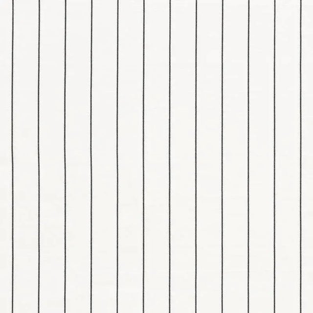 A perfectly simple woven stripe, this heavy, 100% cotton fabric is soft and substantial. It is a wonderfully versatile...
