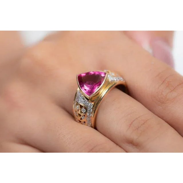 Ruby bridal band ring set in 18K gold with diamonds that enhances your vitality and sensuality and goes well with your...