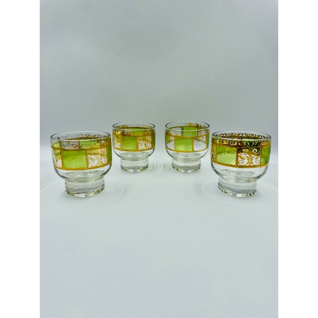 These gorgeous glasses by famed mid-century barware company Culver, feature a vibrant green pattern known as the "Prado"...