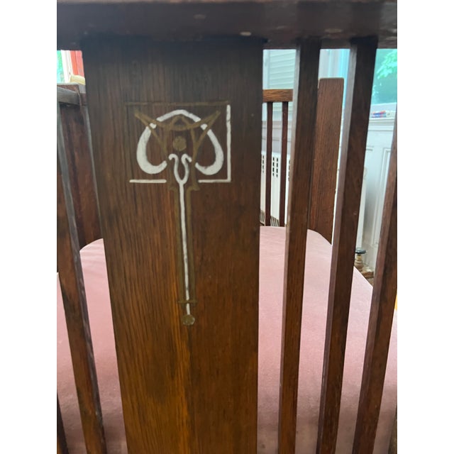 Morris style/arts and crafts style oak chair with slats on side and rear. Upholstered in pink velvet. This is a large...