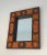 This very nice and interesting small mirror is made of ceramic in the orange tons. This is a very nice French work, circa...