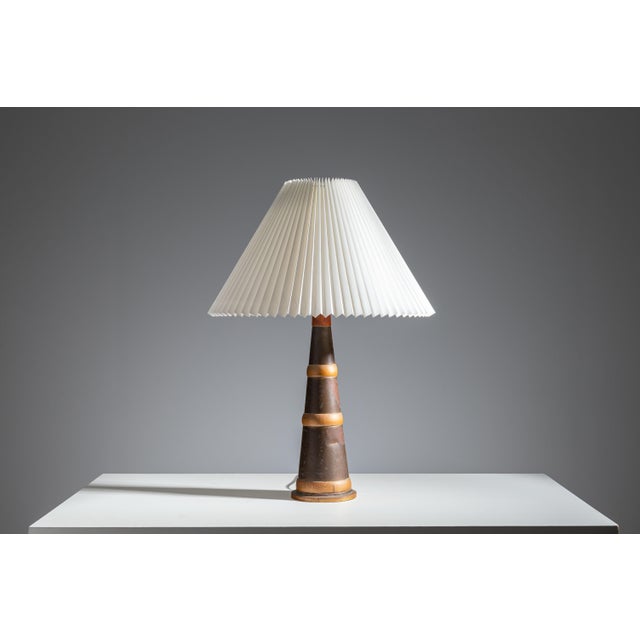 This striking Mid-Century Scandinavian table lamp beautifully embodies the era’s balance between craftsmanship, material...