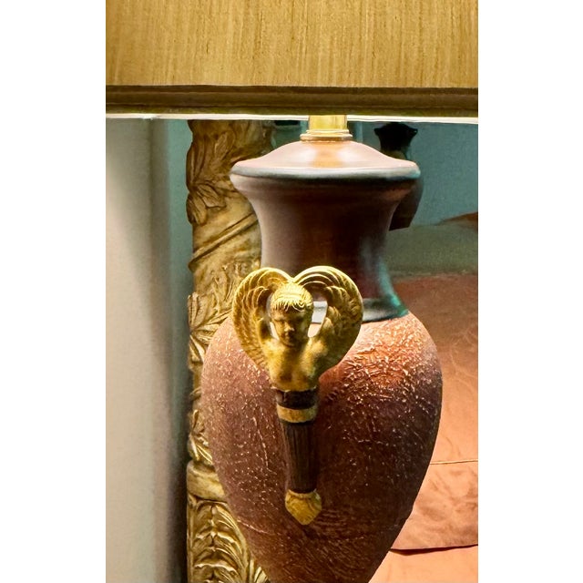 Elevate your space with this exquisite pair of urn-style table lamps, purchased from a top ASID interior designer. These...