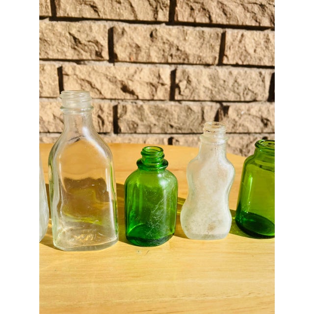 Transparent Early 20th Century Small Glass Bottle Collection - Set of 9 For Sale - Image 8 of 11