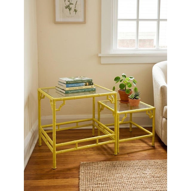 Add a touch of timeless charm to your indoor or covered outdoor space with this pair of Vintage Faux Bamboo Side Tables by...