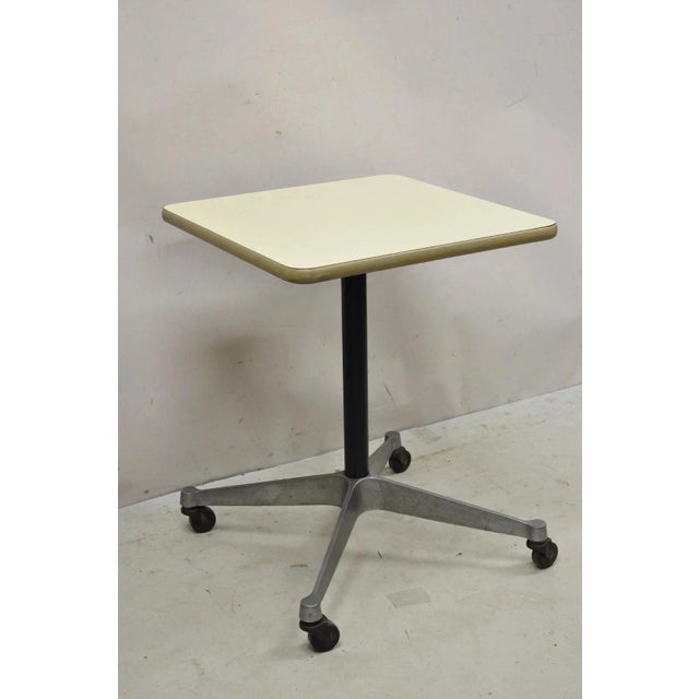 Vintage Herman Miller Eames Mid Century Modern "Aluminum Group" Rolling Contract Base Side Table. Item features an off...
