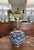 Classic blue and white ginger jar table lamp with dark wood fittings and shiny gold accents. Rigid white linen shade with...
