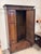 Design Plus Gallery presents an Antique Carved Oak Mirrored Wardrobe from Ray & Miles of Liverpool. The tall cabinet...