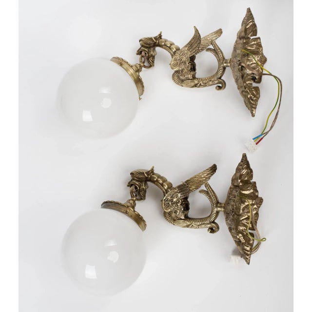 Mid-Century Modern 1950s Spanish Gothic Revival Brass Dragon Wall Sconces With Opal Glass Shades - A Pair For Sale - Image 3 of 9