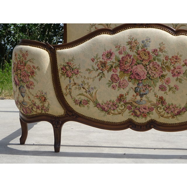 Stunning Louis XV style double bed dating from the 1950s, crafted from solid wood. This model is ideal for adding a retro...