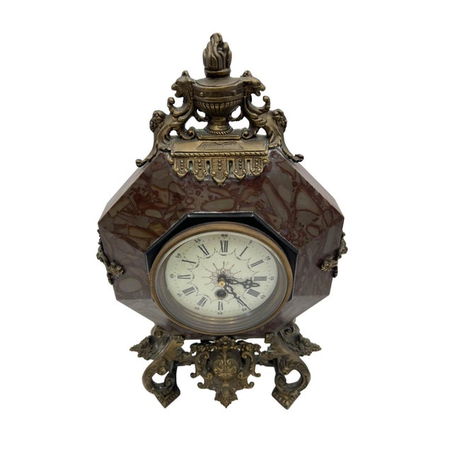 This French Rococo Revival mantel clock dates to the mid-to-late 19th century, circa 1860–1880, and reflects the period’s...