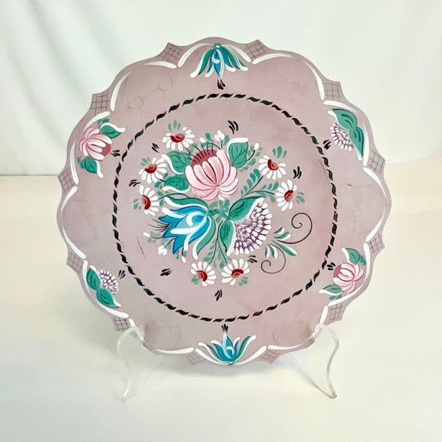 This is a gorgeous hand-painted Wood decorative plate. The piece is from Mexico and features botanical blooms in rose,...