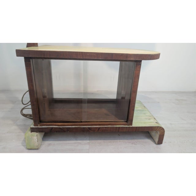 Art Deco Floor Lamp with Table and Bar This stylish, pre-owned Art Deco bedside lamp features a green wooden base and a...