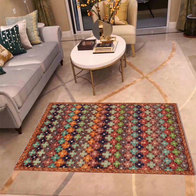 This stunning hand-knotted Afghan Balouchi rug is a captivating addition to any decor. Crafted by skilled artisans, it...
