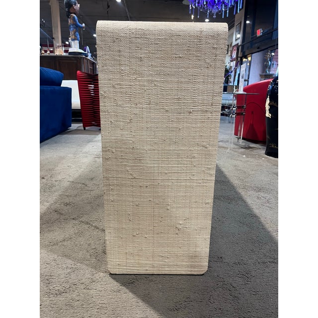 An effortlessly refined statement in texture and tone, the Meadow Console Table by Crate and Barrel brings organic...