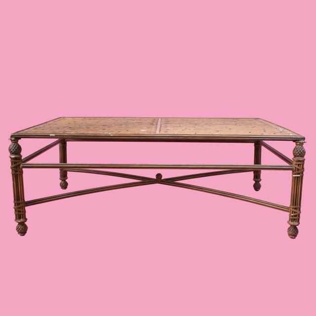 Anchor your living room with this vintage faux bamboo metal coffee table. The sturdy metal construction with bamboo-style...