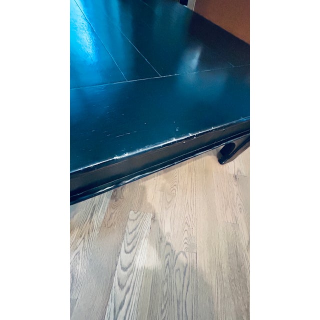 Gently used Arhaus table. Two drawers and two decorative handles on other side. Overall still very good condition except...