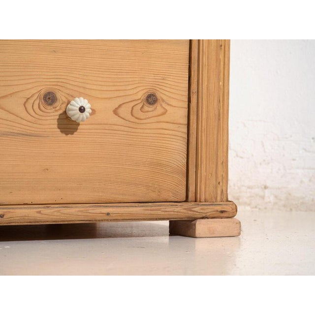 Tall central-european chest of four drawers in washed pine, made in central europe in the late nineteenth or early...