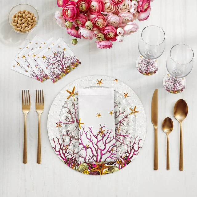 Let the whimsy of the sea wander gracefully into your table with our Coral Reef Vegan Leather Round Pebble Placemat....