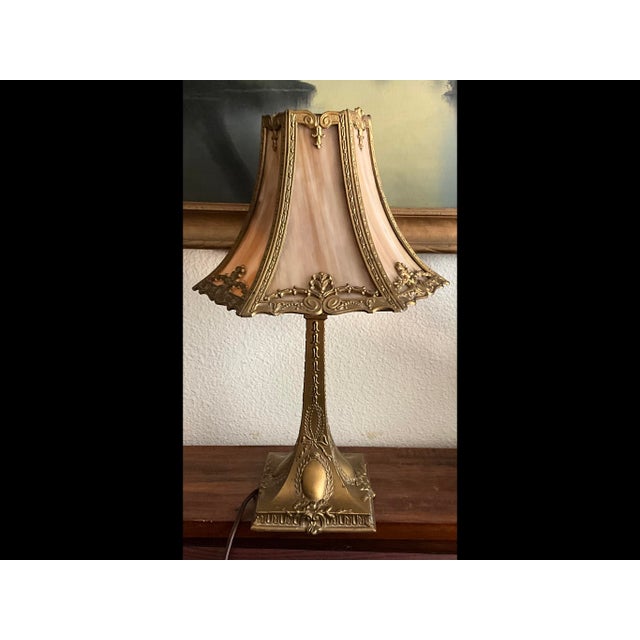 Lovely antique art nouveau boudoir lamp. Excellent used condition. No chips or cracks noted. Minimal signs of wear. 15” tall.
