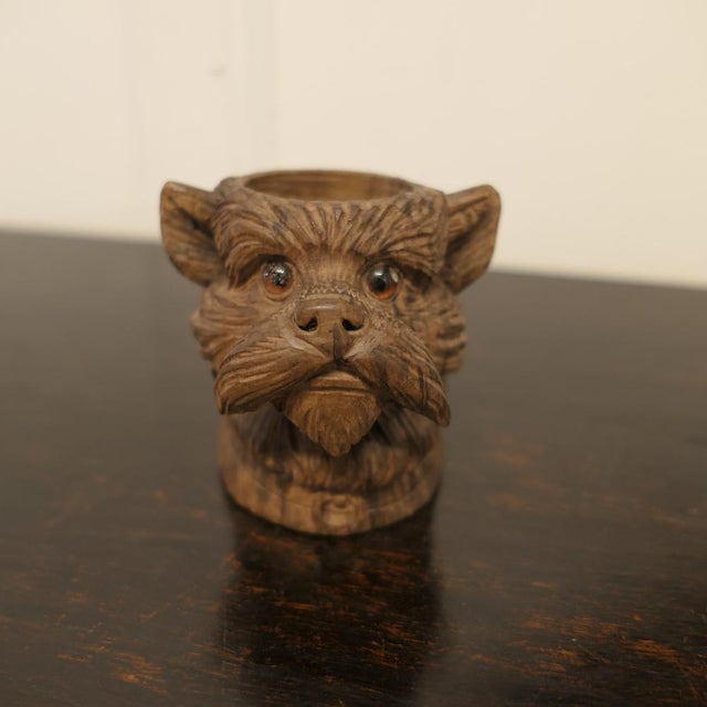 Black Forest Carved Scottie Dog A Charming piece, our little dog has a lovely face with whiskers and amber brown glass...