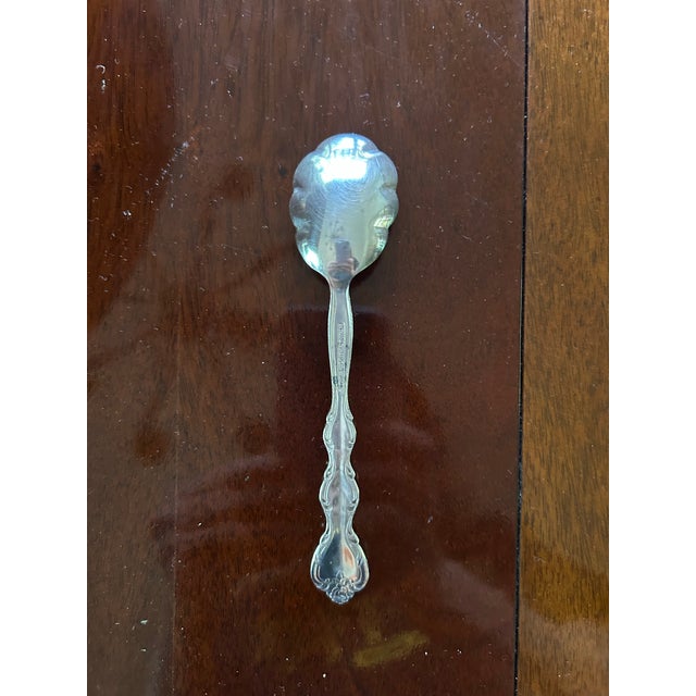 Vintage silverplate sugar shell spoon in the Interlude pattern introduced by International Silver Company in 1971. 6"...