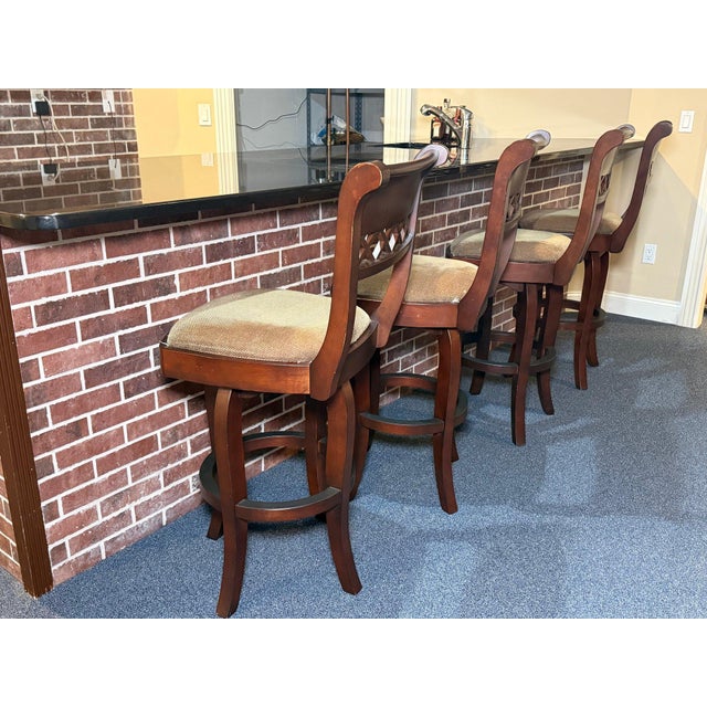 Set of two, two have sold VERY SOLID Cherry-Finished Decorative Criss Cross Back Swivel Bar Stools with Upholstered Seats...