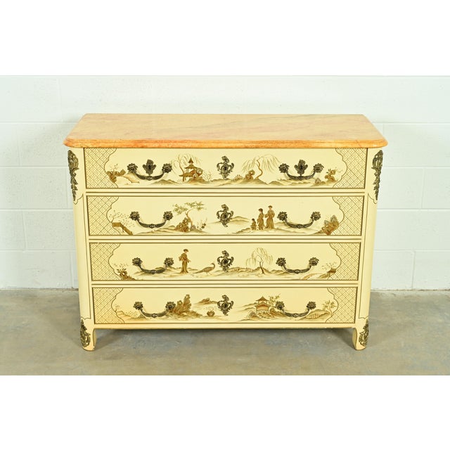 An outstanding French Regency Louis XVI Chinoiserie style dresser or chest of drawers In the manner of Baker Furniture...
