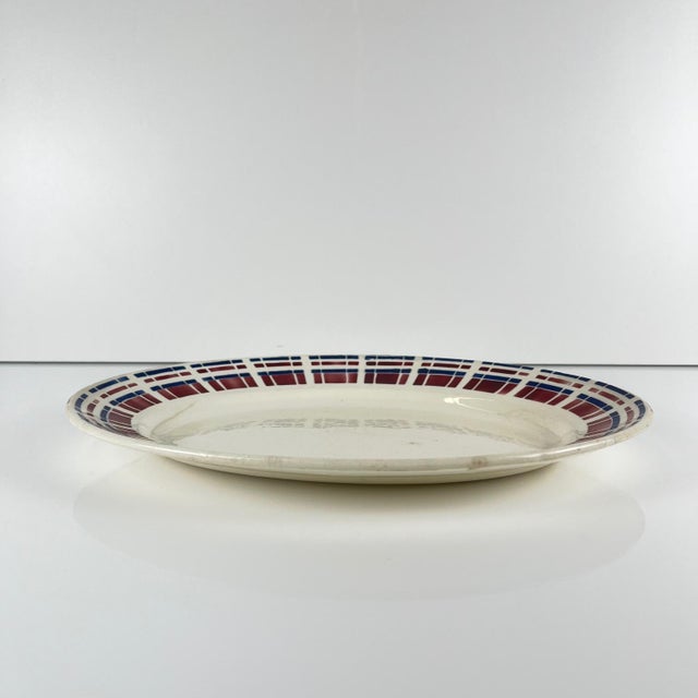 Badonviller Oval Platter, "Scottish" Pattern, Art Deco, 1930 Red and blue geometric design Dimensions: 31.5 x 22 cm...