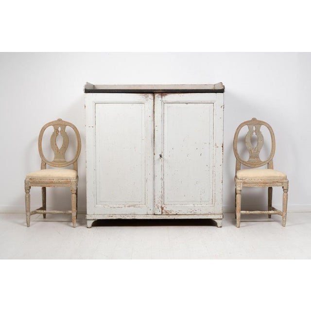Swedish country furniture sideboard in folk art from northern Sweden. The sideboard is from the early 1800s, likely the...