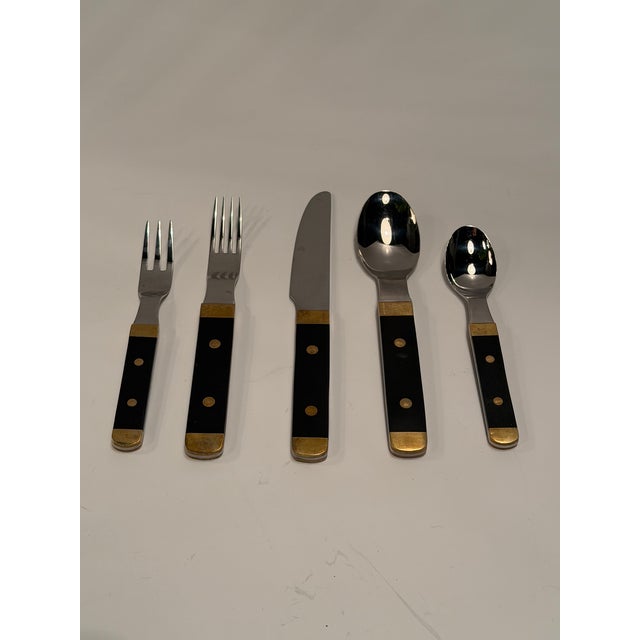 Total of barely used 100 pieces of rare Swedish mixed material flatware, having a stylish combination of stainless steel,...