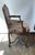 Louis XV style caned walnut arm chair. Velvet upholstered cushion and arm rests.