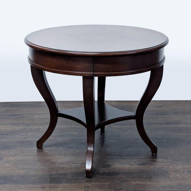 Cabriole legs. Dimensions (in): 29W x 29D x 25H.