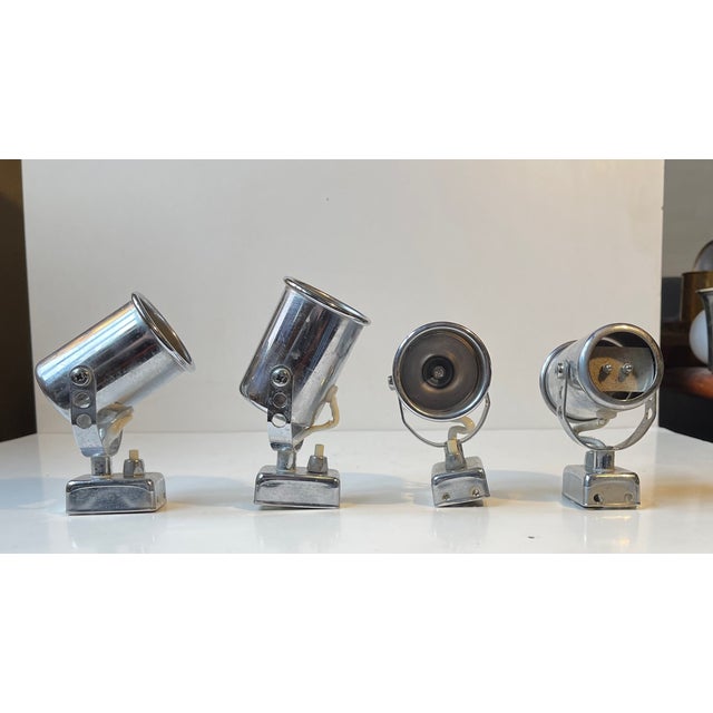 A set of 4 matching small Italian Wall Lights in chrome-plated steel. All original with pin on/off switches and adjustable...