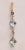A pair of long dangle chandelier earrings with large, diamond-shaped aquamarine gemstones and round, faceted aquamarines...
