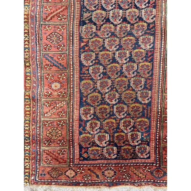 Very beautiful and very old north western runner with beautiful botteh design and beautiful natural colors, with eggplant...