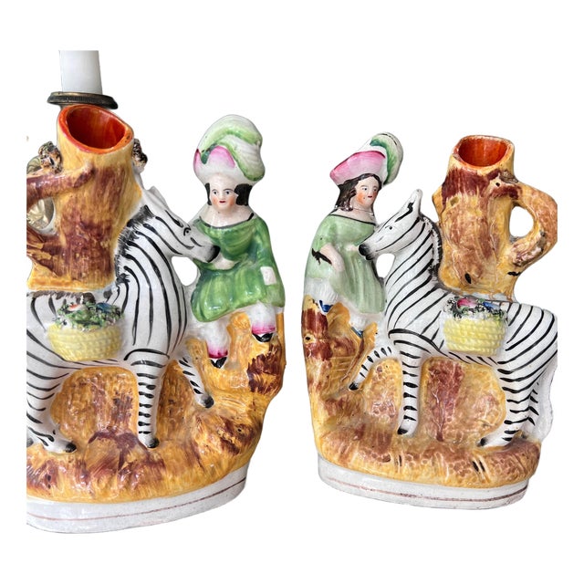 Rare pair of Staffordshire girls riding on zebras spill vases // hand-painted English antique // collectible // English country decor For Sale