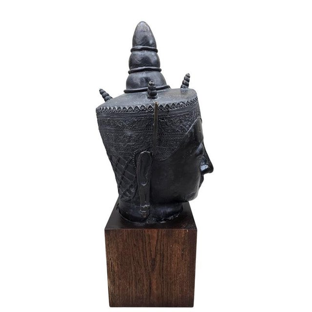 Vintage Southeast Asian Bronze Buddha Head Mounted on Rectangular Wood Base Large decorative bronze Buddha head sculpture...