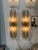 Stylish pair of "Fume" Murano glass sconces. Featuring layers of glistening glass. Very nice!