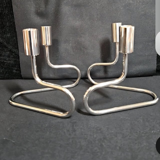 These vintage modernist Italian silver plated candle holders set is from the 1950s. This poseable art piece is stamped...