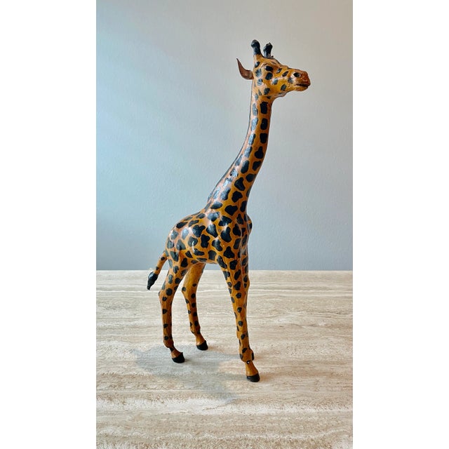 Beautiful Sculpted Leather Giraffe Sculpture. Great decorative addition for a bookshelf.