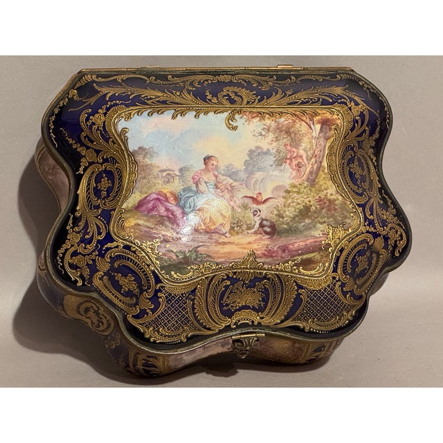 Antique Sévres Porcelain Jewellery Box – French Rococo – Circa 1860s – Bleu de Roi & Gilt This exceptional antique French...