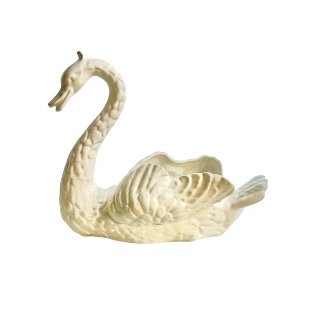 Bring timeless sophistication to your interior with this striking mid-century swan-shaped decorative bowl. Crafted in an...