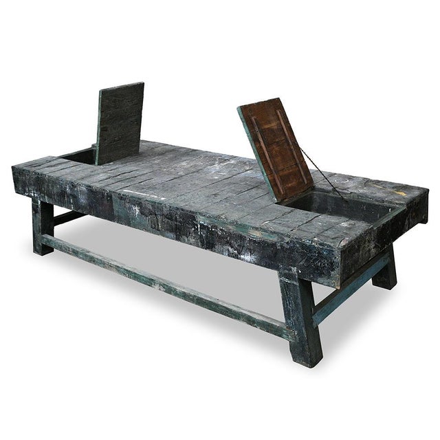 This large artisan table in patinated solid wood is a real piece of character, imbued with history and functionality. with...