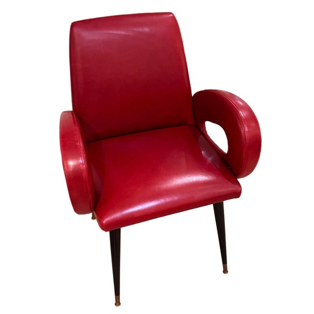 A very stylish pair of 1950s Italian leather arm or bridge chairs. They are covered in red leather, which is in great...