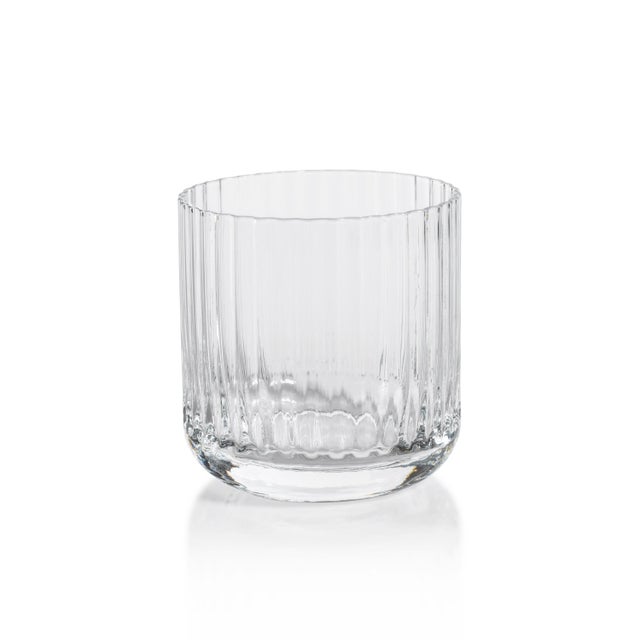 This is a set of classic Double Old-Fashioned glasses, perfect for any home bar or entertainment space. Subtly rippled...