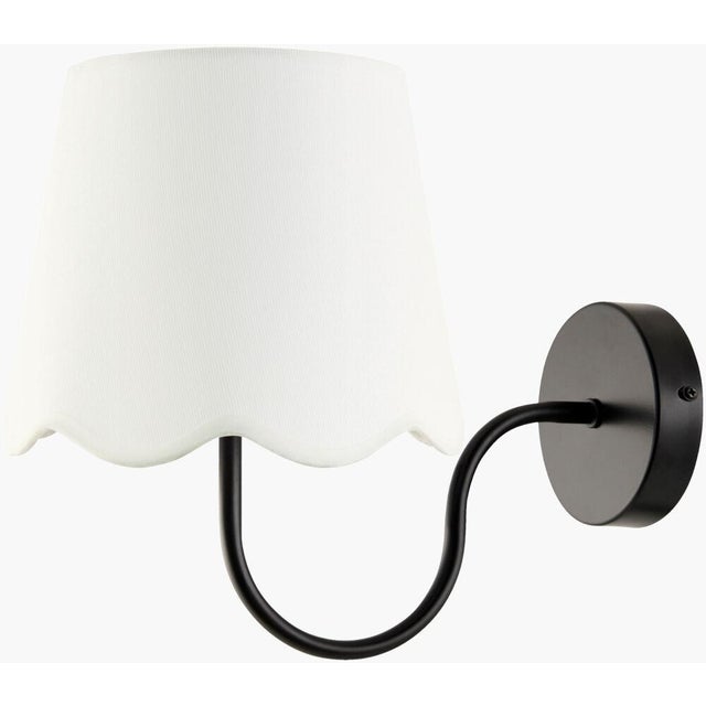Illuminate your space with the timeless charm of the Elanora wall sconce lighting. This exquisite fixture is a perfect...